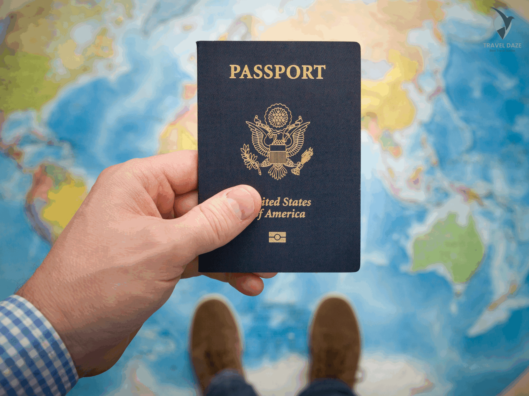 Man's hand holding US passport.